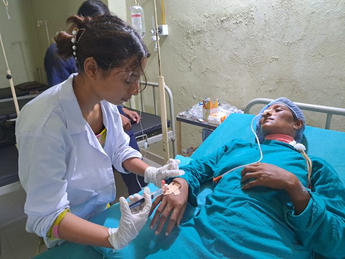 doctor treating a patient with cancer
