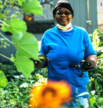a woman in a community garden