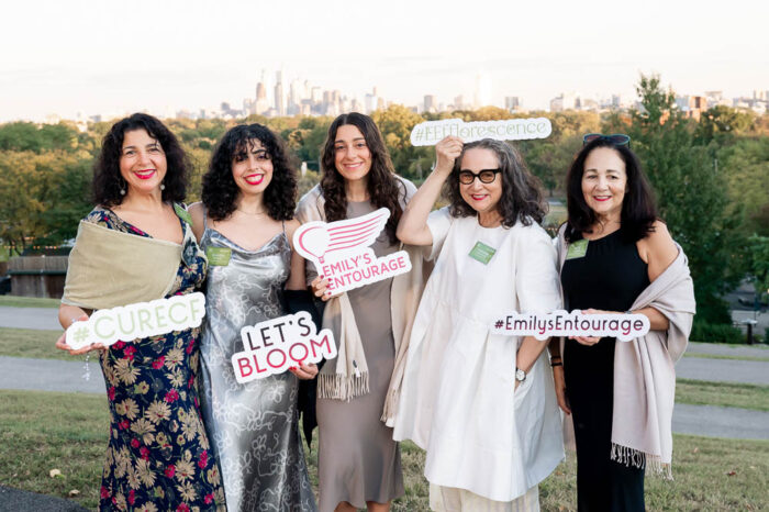 Emily's Entourage women at a gala posing for a photo