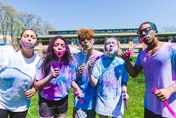 Fairfield University students blowing bubbles