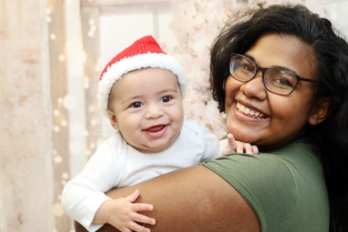 Health Imperatives - mother and child at Christmas