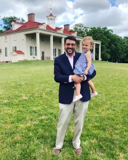 Joe Bondi with his daughter Coco in front of a GWMV building