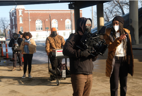 documentary crew walking on set