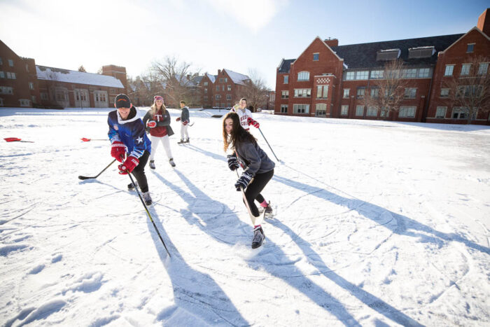Taft School students playing ice hockey outside